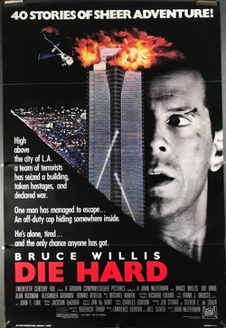 Die Hard poster. A building is on fire, a red explosion at the top contrasting with the greys and blacks elsewhere. Half obscured by the building is Bruce Willis face, a white man, in black and white. He is beat up. He looks fearful but determined, his one visible eye looking toward the building.