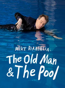 The Old Man & The Pool poster. Mike Birbiglia, a middle aged white man, swims in a pool in a suit.