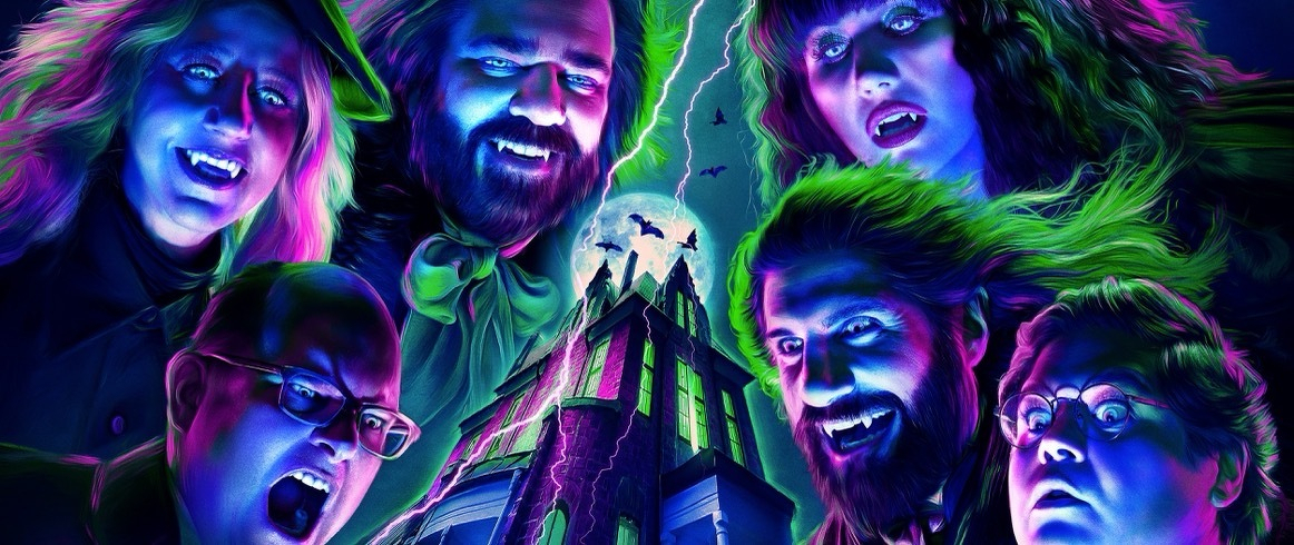 Auto-generated description: A group of six people with glowing, colorful lighting are surrounding a towering, ominous building with bats flying around it and a full moon in the background.